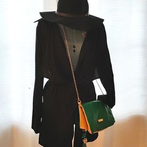 Black tie up sexy cute dress size small to medium. Purse and hat not included.